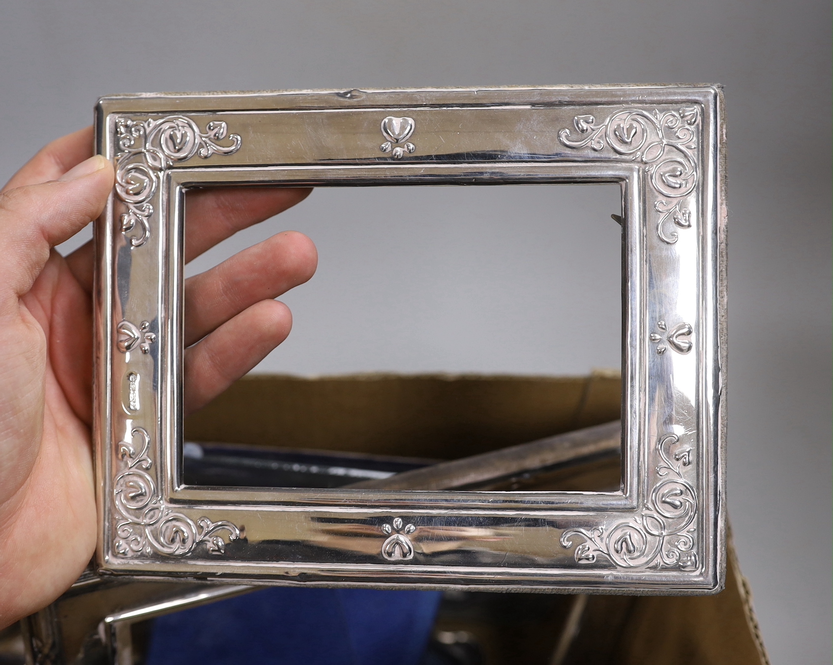 Eight assorted modern silver mounted photograph frames, including a pair, largest 25.6cm and three mounted glass scent bottles.